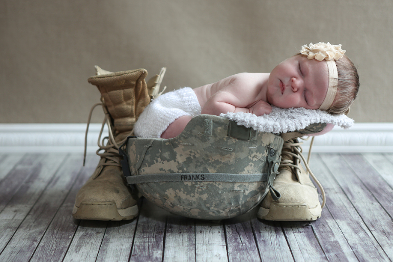 Newborn Baby In Army Helmet