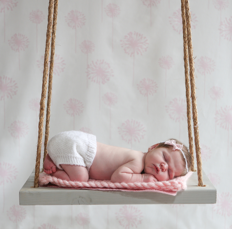 Newborn Baby On Swing
