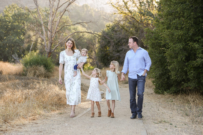 Los Angeles Family Photographer, Family Photo Malibu State Creek Park, Family walking on a nature trail. 