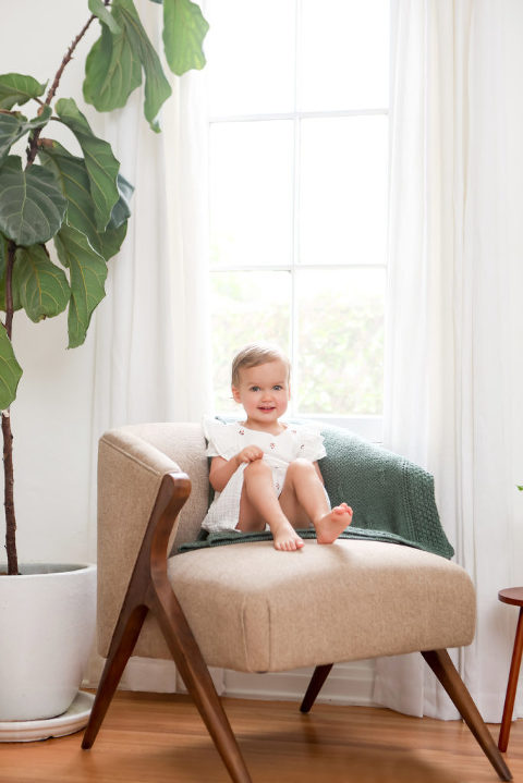 2 Year Old Girl in mid century modern chair, Los Angeles Photography Session