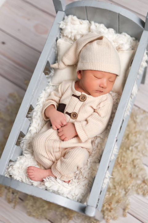 Glendora Newborn Baby Photography Session, Baby on Newborn Crib Prop, Arrow Background, Diana Henderson Photography