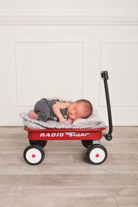 Glendora Newborn Baby Photography Session, Baby on Newborn Radio Flyer Wagon Prop, Arrow Background, Diana Henderson Photography